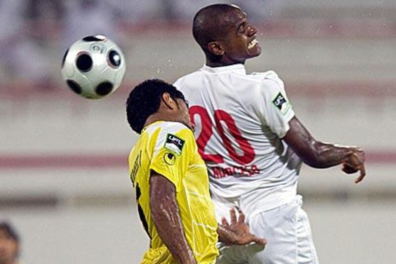 Sharjah’s Marcelinho, right, outjumps Al Wasl’s Waheed Ismail in Pro League action earlier this month.