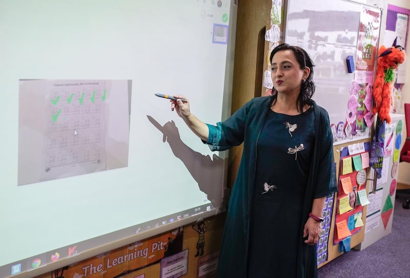 Abu Dhabi, United Arab Emirates, March 19, 2020.  
   Private schools in UAE gear up for for remote learning and challengest hey will face.
Teacher, Taira Astab during an online lecture at the Al Yasmina Academy.
Victor Besa / The National
Reporter:   Anam Rizvi
Section:  NA