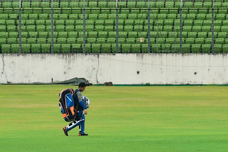Bangladesh cricketer Mushfiqur Rahim walks off the field after attending an individual training session at the Sher-e-Bangla National Cricket Stadium in Dhaka. AFP