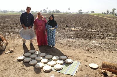 Chef John Torode in Luxor, with Eishaa, Hayat and champsey bread, during the filming of his Middle East series. Photo: Tom Fowlie