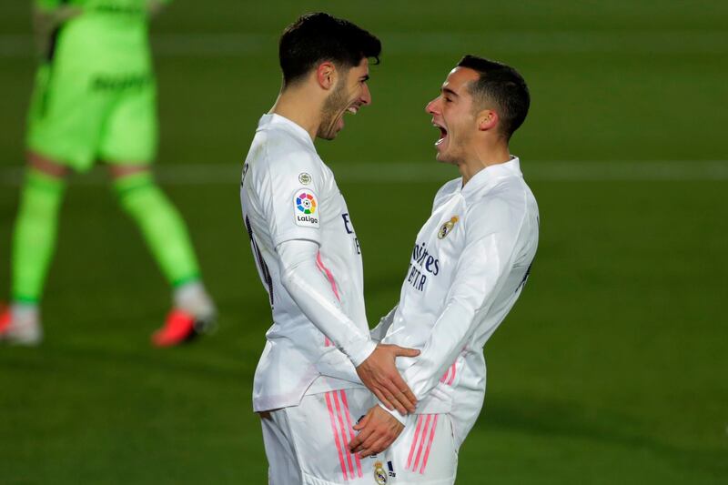 Asensio, left, celebrates with teammate Lucas Vazquez . AP