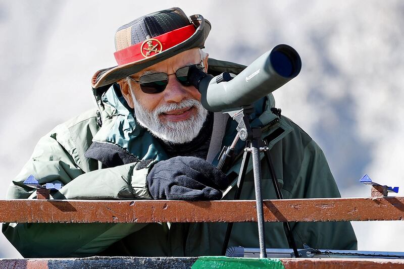 Mr Modi scopes out the mountainous terrain.