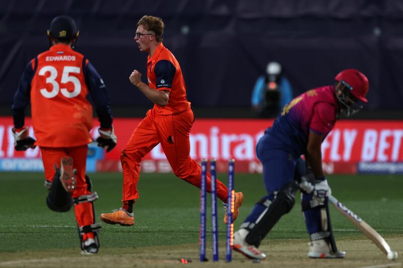 Netherlands' Tim Pringle bowls UAE's Kashif Daud. AP