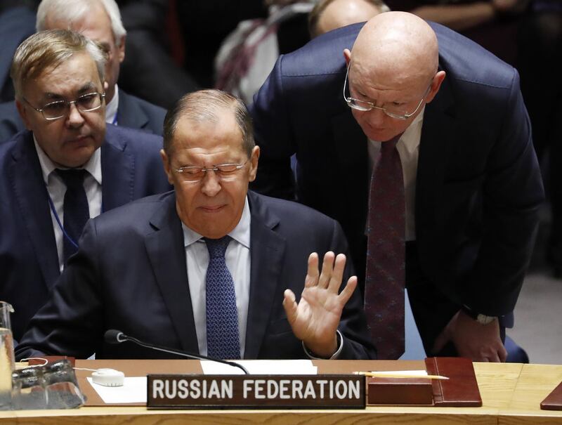 Russian foreign minister Sergey Lavrov (L) reacts during a UN Security Council meeting on the sidelines of the 73rd session of the General Assembly.  EPA