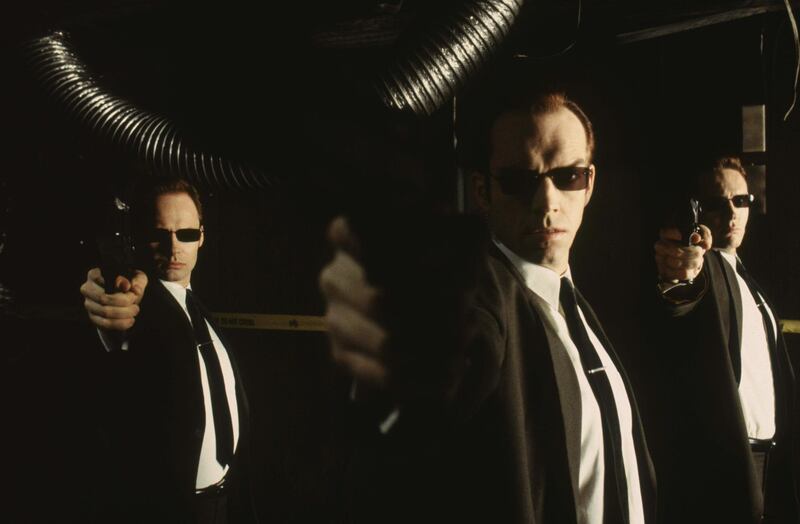 Hugo Weaving, Robert Taylor and Paul Goddard in The Matrix. Courtesy Warner Bros.