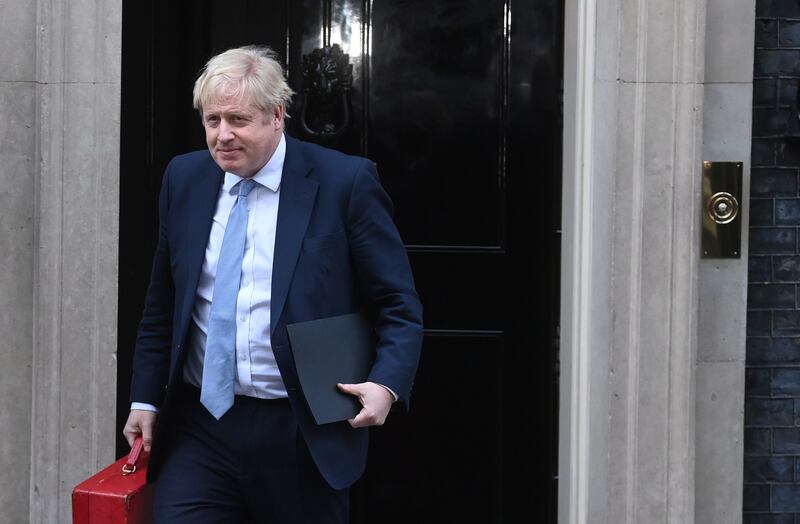 British Prime Minister Boris Johnson leaves Downing Street in London on January 31. EPA