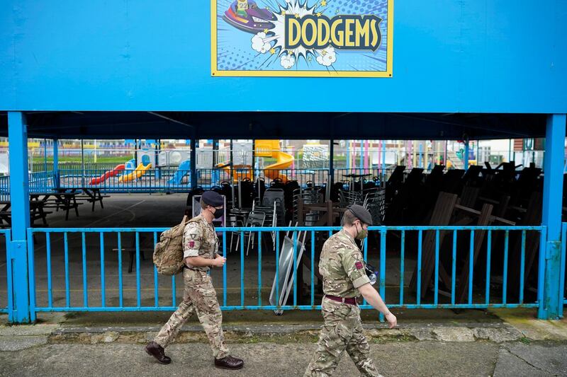 Members of the military arrive at Pontins. The UK government are piloting loop mediated isothermal amplification (LAMP) testing technology, offering all Liverpool residents quick-result tests. Getty Images