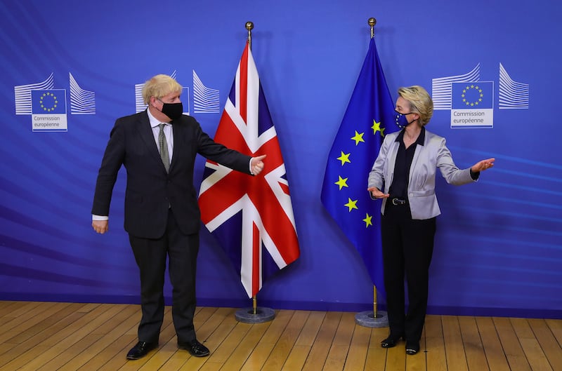 Mr Johnson and European Commission President Ursula von der Leyen meet for a dinner to try to reach a breakthrough on a post-Brexit trade deal, in December 2020 in Brussels. Getty Images