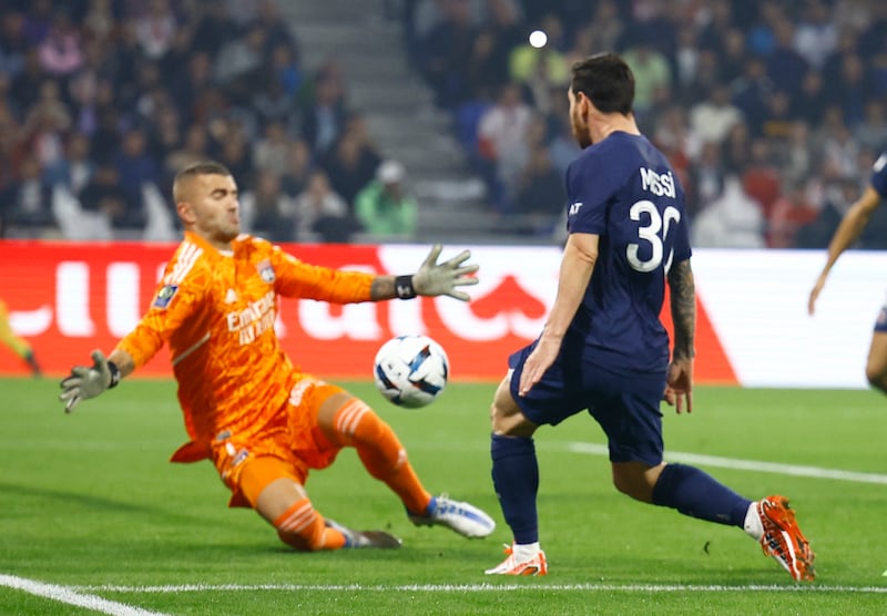 PSG's Lionel Messi has his shot saved by Olympique Lyonnais' Anthony Lopes. Reuters