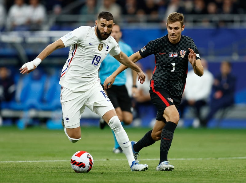 France's Karim Benzema under pressure from Josip Stanisic of Croatia during the Nations League match in June 2022. Reuters