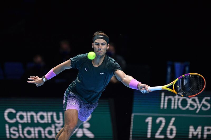 Rafael Nadal returns against Dominic Thiem. AFP