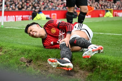 Manchester United defender Lisandro Martinez after injuring his knee against West Ham at Old Trafford. Getty Images