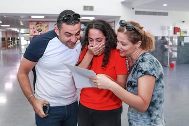 Pupils receive their GCSE results at Dubai British School in August 2013. Victor Besa / The National 