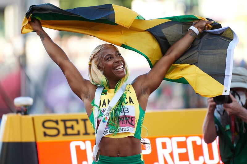 Gold medalist Shelly-Ann Fraser-Pryce of Jamaica, celebrates after winning the women's 100 meter final, during the IAAF World Athletics Championships, at  Hayward Field stadium, in Eugene, Oregon, USA, 17 July 2022.   EPA / JEAN-CHRISTOPHE BOTT POLAND OUT