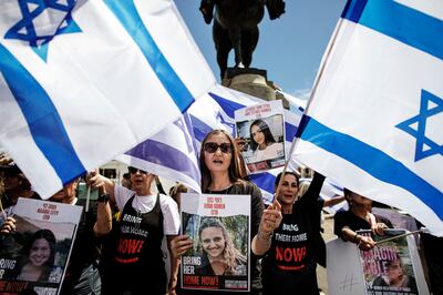 Protesters campaign for the return of kidnapped Israeli women and girls during a demonstration outside the South African parliament in Cape Town. AFP