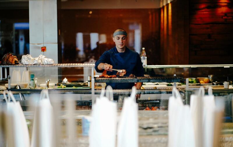 A chef at work in the Roka kitchen