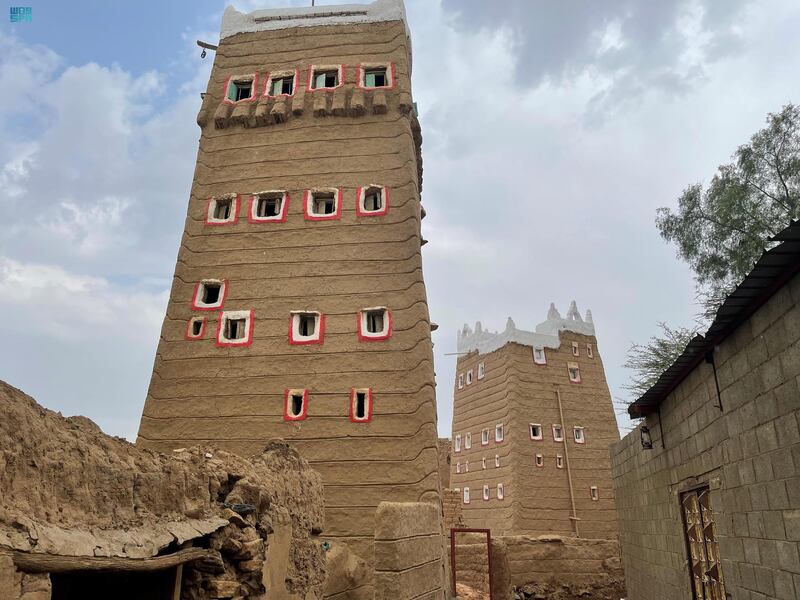 The historic town features traditional mud-brick buildings. SPA