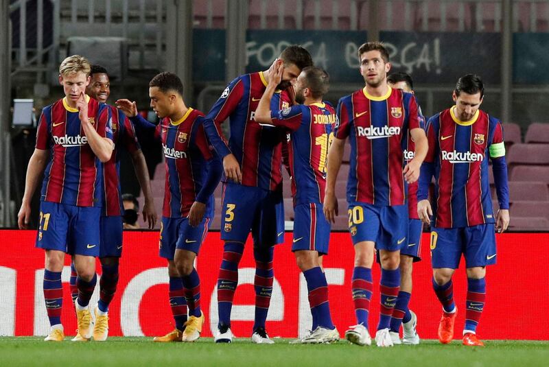 Barcelona's Gerard Pique celebrates scoring their second goal. Reuters