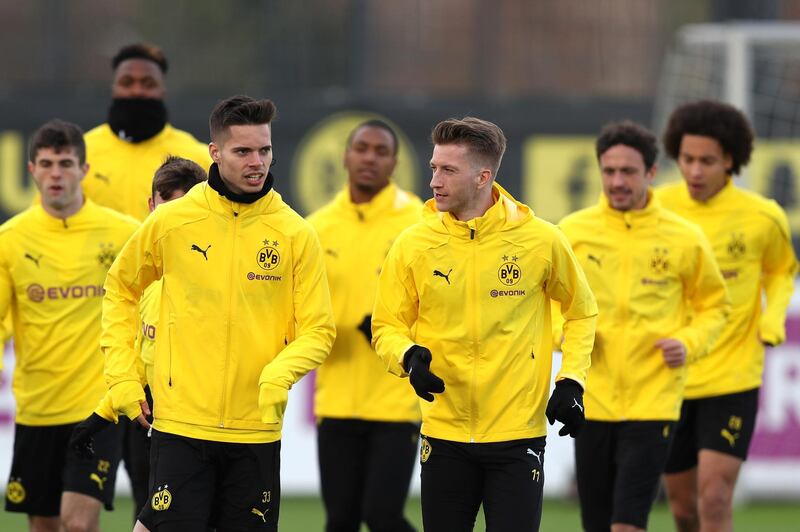 DORTMUND, GERMANY - MARCH 04: Marco Reus and Julian Weigl during a Borussia Dortmund training session ahead of their UEFA Champions League Round of 16 Second Leg match against Tottenham Hotspur on March 04, 2019 in Dortmund, Germany. (Photo by Alexandre  (Photo by Maja Hitij/Getty Images)
