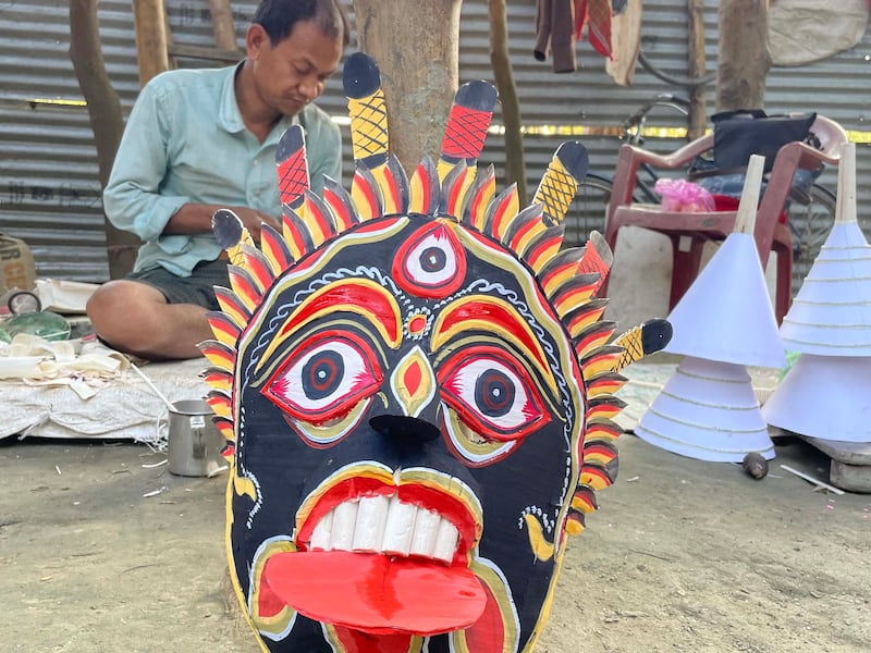 A sholapith, or Indian cork, craftsman at work. Ritam Ghosal and Archi Banerjee for The National