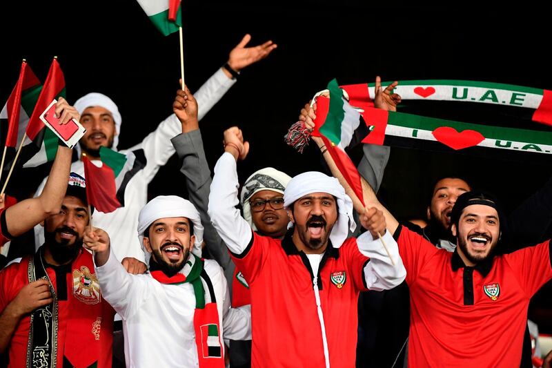 Emirati supporters cheer ahead of the match. AFP
