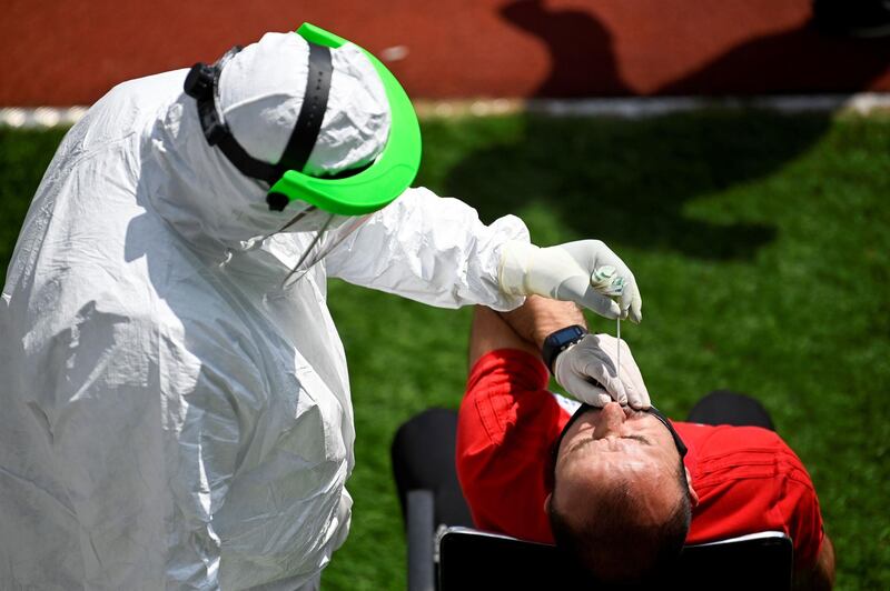 A Kosovar football referee gets tested at the Fadil Vokrri Stadium in Pristina.  AFP