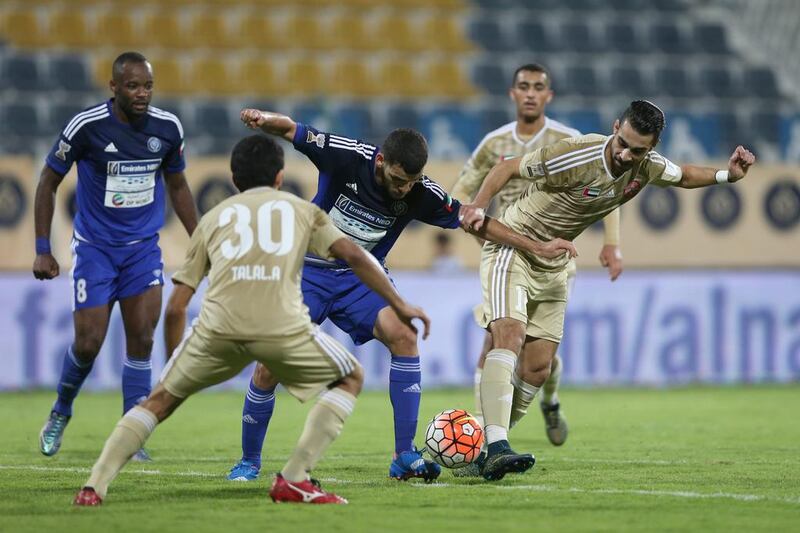 Al Nasr, in blue, emerged 1-0 victors over Al Shaab on home turf at the Al Maktoum Stadium in Dubai. Ashraf Al Amra / Al Ittihad