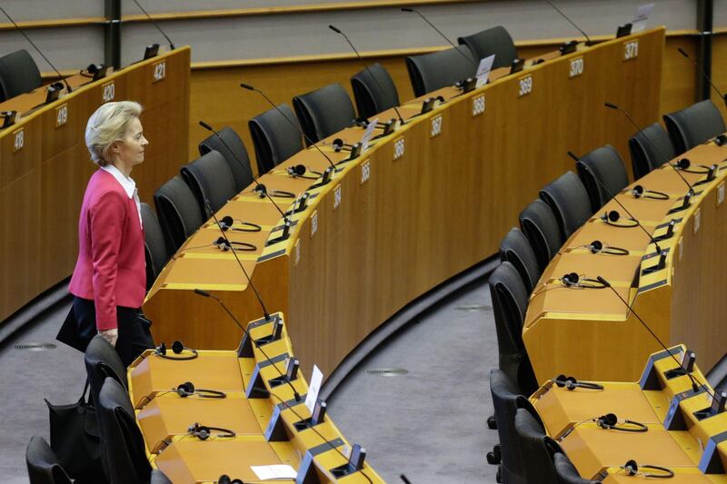 President of European Commission, Ursula Von der Leyen arrives prior a mini plenary session of European Parliament in Brussels, Belgium,  on March 26, 2020.   Due to Coronavirus pandemic, plenary session is reduced to one day and mainly operated as a video conference. / AFP / Aris Oikonomou

