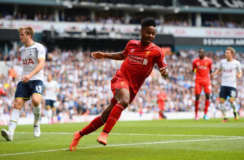 Raheem Sterling of Liverpool celebrates his goal against Tottenham Hotspur on Sunday in his side's Premier League victory. Jamie McDonald / Getty Images