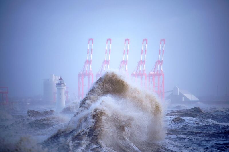 Waves whipped up by the wind of Storm Eleanor lash against the sea wall in New Brighton. Christopher Furlong / Getty Images