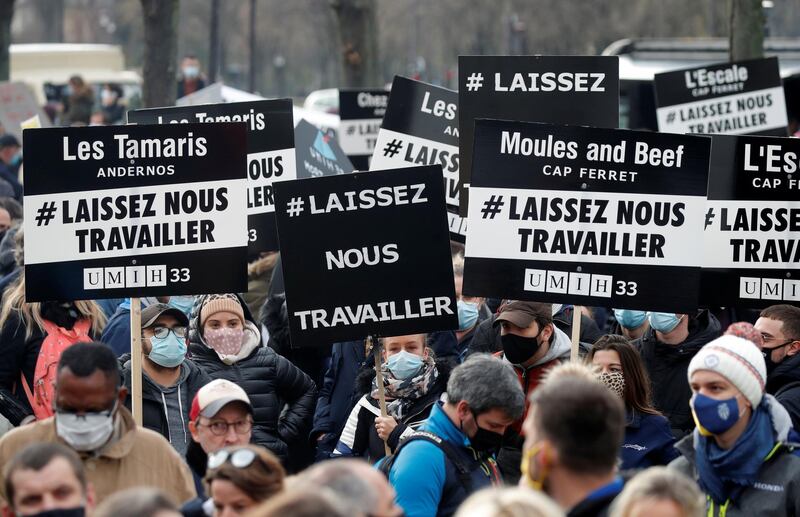 Restaurants, cafes, and night clus owners attend a demonstration to protest against government measures in Paris, France. Reuters