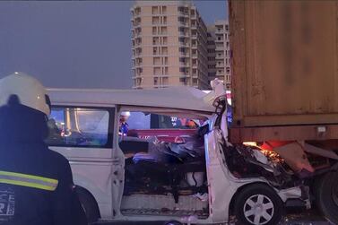 The minibus was partially crushed when it hit a stationary lorry on Sheikh Mohamed bin Zayed Road, near City Centre Mirdif mall. Courtesy Dubai Police