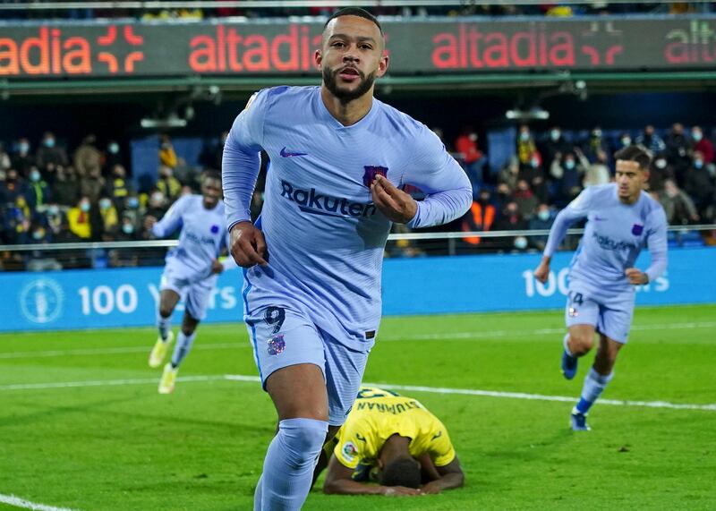 Barcelona's Memphis Depay celebrates after scoring his side's second goal. AP Photo