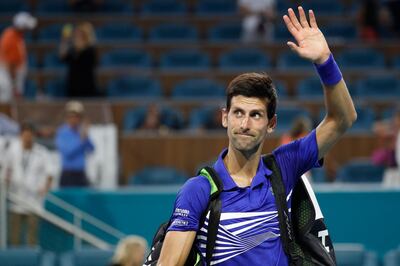 Mar 26, 2019; Miami Gardens, FL, USA; Novak Djokovic of Serbia waves to fans while leaving the court after his match against Roberto Bautista Agut of Spain (not pictured) in the fourth round of the Miami Open at Miami Open Tennis Complex. Mandatory Credit: Geoff Burke-USA TODAY Sports