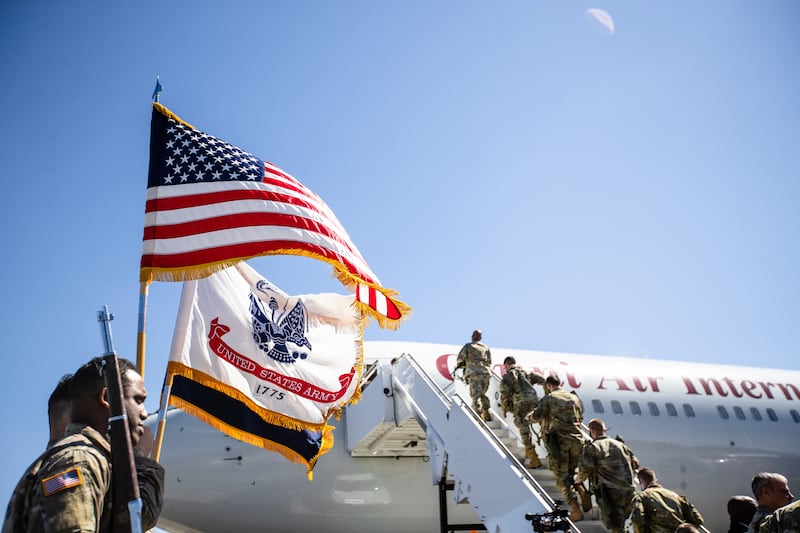 Members of the US Army 3rd Infantry Division board a plane bound for Germany in Savannah, Georgia. EPA