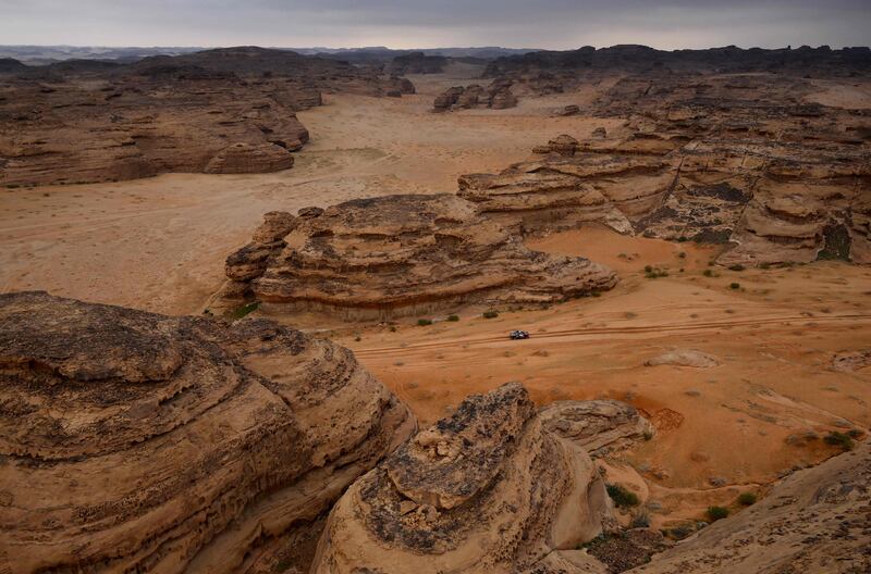 Audi driver Stephane Peterhansel and his co-driver Edouard Boulanger compete during stage 3 of the Dakar 2023 rally in Saudi Arabia. AFP