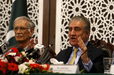 epa07398870 Pakistan's Foreign Minister Shah Mehmood Qureshi (R) and Pakistan's Defense Minister Pervez Khattak talk with journalists after Indian Air Force violated Pakistani Air Space, in Islamabad, Pakistan, 26 February 2019. Pakistan Foreign Minister described the actions of India as a 'grave aggression' and violation of the Line of Control, the de-facto border between the two sides in the disputed Kashmir region. On 26 February, the Pakistani army accused India of dropping bombs on its territory without causing any damage or casualties.  EPA/T. MUGHAL