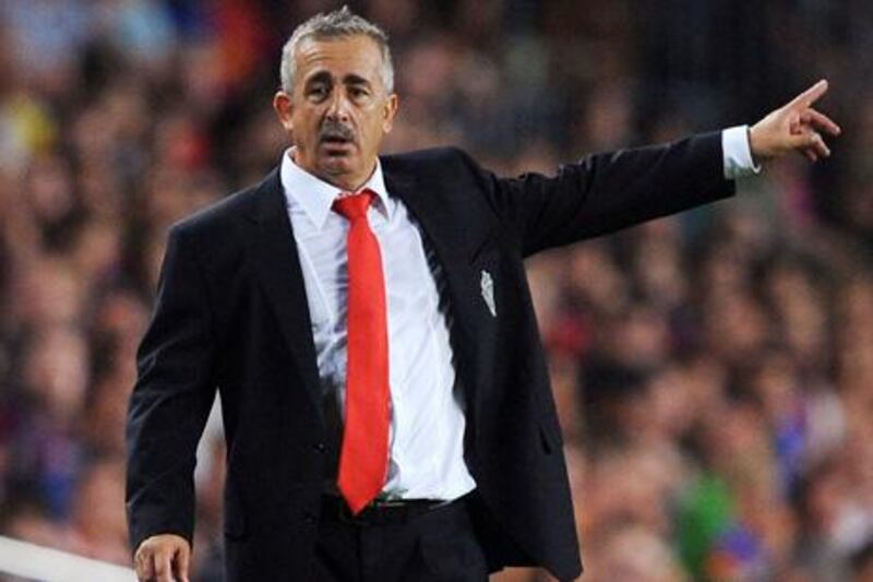 BARCELONA, SPAIN - AUGUST 31:  (FILE PHOTO)  Sporting Gijon manager Manuel Preciado signals to his team during the La Liga match between Barcelona and Sporting Gijon at the Nou Camp stadium on August 31, 2009 in Barcelona, Spain. Manuel Preciado has died of a heart attack, aged 54, only a day after the announcement that he was to take up the post as the new head coach of Villarreal.  (Photo by Denis Doyle/Getty Images)