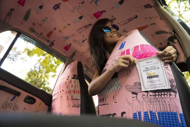Pranita Kocharekar in the taxi she designed. Courtesy Amedya Kadam