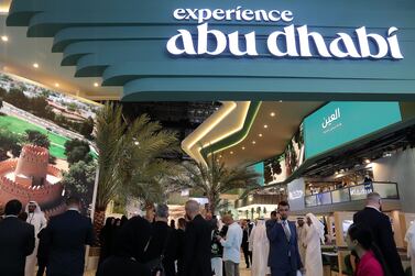 Visitors at the Abu Dhabi stand last year at the Arabian Travel Market, at Dubai World Trade Centre in Dubai. Pawan Singh / The National