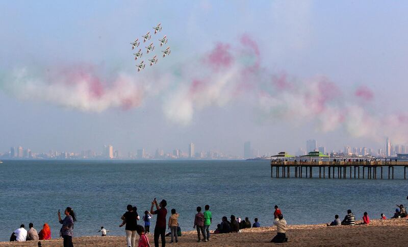 The Italian Air Force's aerobatic team performs in Kuwait City, Kuwait. AFP