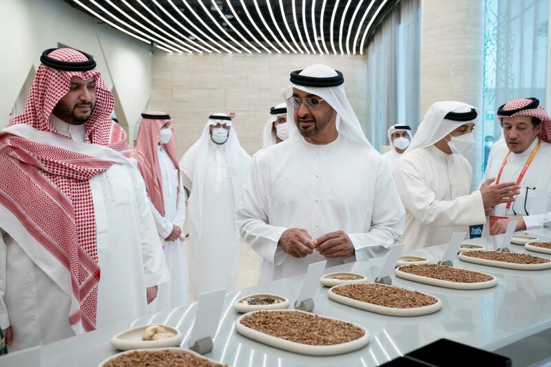 Sheikh Mohamed bin Zayed during a visit to the Saudi Arabia pavilion at Expo 2020 Dubai, with Sheikh Mansour bin Zayed, Deputy Prime Minister and Minister of Presidential Affairs, second right, Prince Turki bin Mohammed, Minister of State and member of the Cabinet of the Kingdom of Saudi Arabia, left, and Turki bin Abdullah, Saudi Arabia's ambassador to the UAE.