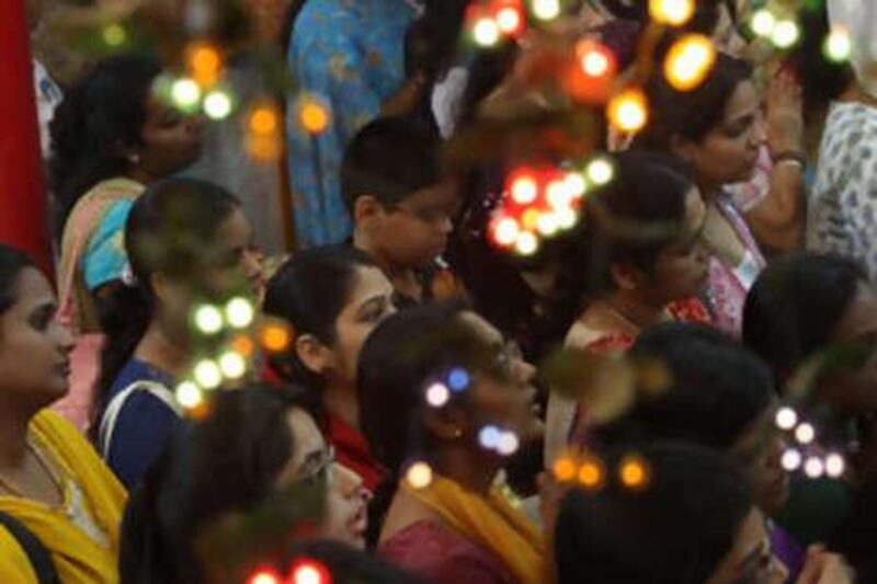 People offer prayers for Diwali at the temple in Bur Dubai.