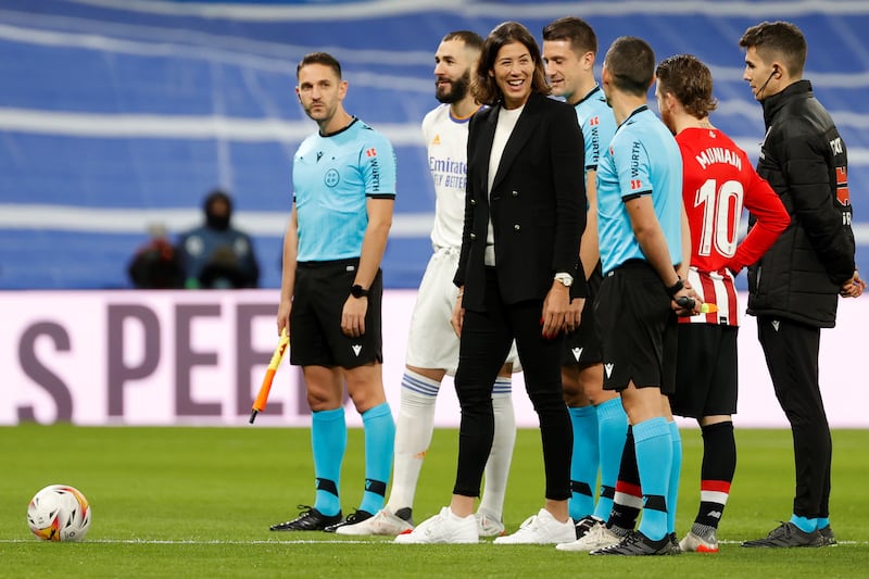 Garbine Muguruza, centre, during her tribute ceremony ahead of the LaLiga match between Real Madrid and Athletic Bilbao at Santiago Bernabeu on December 1, 2021. EPA