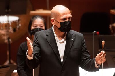Music Director Jaap van Zweden conducts the New York Philharmonic's first concert after its reopening at the Alice Tully Hall in New York, on September 17, 2021. AFP