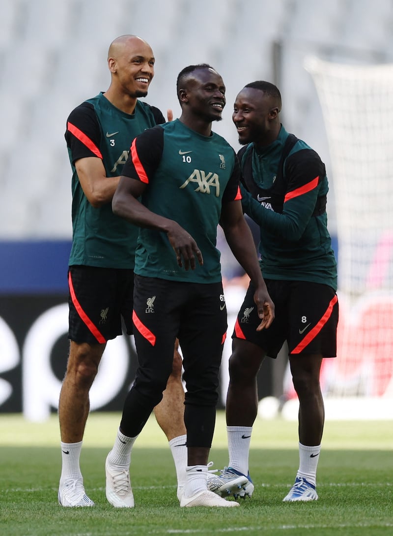 Liverpool's Sadio Mane, Fabinho and Naby Keita during training. Reuters