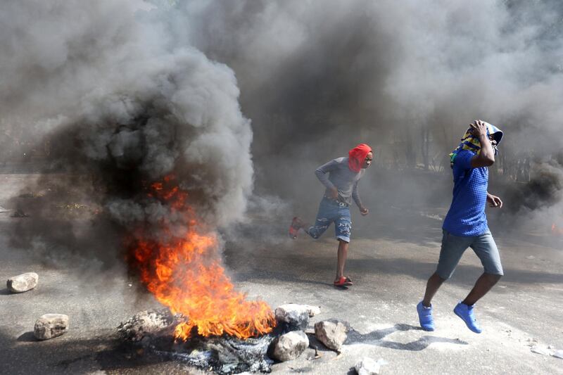 Demonstrators take part in a protest against former government officials accused of misusing Petrocaribe funds and the country's inflation rate in Port-au-Prince, Haiti. Reuters