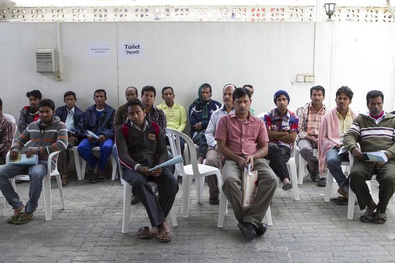 More than 600 Bangladeshis are visiting the embassy in Abu Dhabi every day to apply for a new machine-readable passport. Mona Al Marzooqi / The National