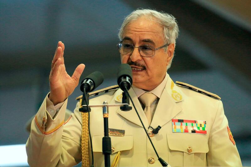 (FILES) In this file photo taken on May 07, 2018 Libyan Strongman Khalifa Haftar attends a military parade in the eastern city of Benghazi. Libyan strongman Khalifa Haftar ordered his troops on April 4 to "advance" on Tripoli, seat of the internationally-recognised unity government, after UN chief Antonio Guterres warned against a major flare-up. Haftar's forces announced Wednesday they were gearing up for an offensive in the west of the country to purge it of "terrorists and mercenaries". Following that statement, a convoy of LNA vehicles pushed towards the city of Gharyan, some 100 kilometres (60 miles) from Tripoli, witnesses and military sources said.  / AFP / Abdullah DOMA
