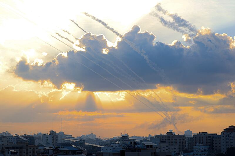 Rockets fired from Gaza City towards Israel rise into the early morning sky. AFP